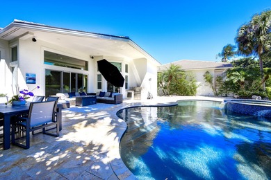 Live luxuriously on the 16th green of the Arnold Palmer on Frenchmans Reserve in Florida - for sale on GolfHomes.com, golf home, golf lot