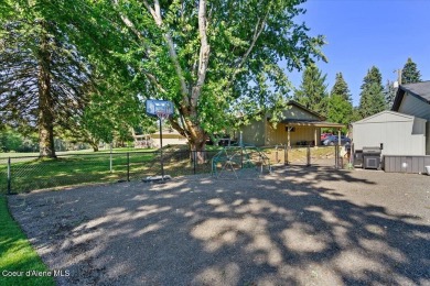 Nestled on the 7th green and 8th teebox of Avondale Golf Course on Avondale Golf and Tennis Club in Idaho - for sale on GolfHomes.com, golf home, golf lot