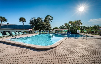 Come view this beautifully furnished two-bedroom, two-bath with on Palm Hill Golf Club in Florida - for sale on GolfHomes.com, golf home, golf lot