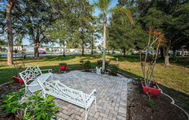Come view this beautifully furnished two-bedroom, two-bath with on Palm Hill Golf Club in Florida - for sale on GolfHomes.com, golf home, golf lot