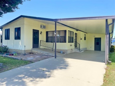 If we told you that the enclosed storage room attached boasts as on Lakes at Leesburg Golf Course in Florida - for sale on GolfHomes.com, golf home, golf lot