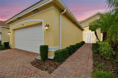 An opportunity to own a Nantucket model villa with a water view on Caloosa Greens Executive Golf Course in Florida - for sale on GolfHomes.com, golf home, golf lot