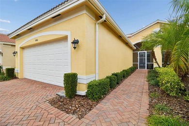 An opportunity to own a Nantucket model villa with a water view on Caloosa Greens Executive Golf Course in Florida - for sale on GolfHomes.com, golf home, golf lot