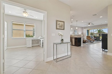 An opportunity to own a Nantucket model villa with a water view on Caloosa Greens Executive Golf Course in Florida - for sale on GolfHomes.com, golf home, golf lot