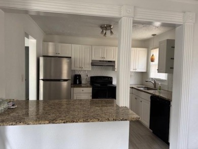 East Atlanta Deal:  This four side brick single family house was on East Lake Golf Club in Georgia - for sale on GolfHomes.com, golf home, golf lot