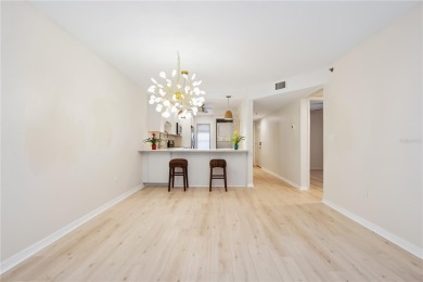 Renovated first floor condo with 2 bedrooms and 2 full baths on Capri Isle Golf Club in Florida - for sale on GolfHomes.com, golf home, golf lot