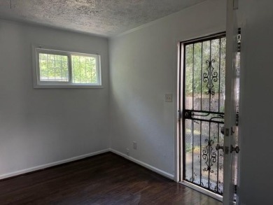 East Atlanta Deal:  This four side brick single family house was on East Lake Golf Club in Georgia - for sale on GolfHomes.com, golf home, golf lot