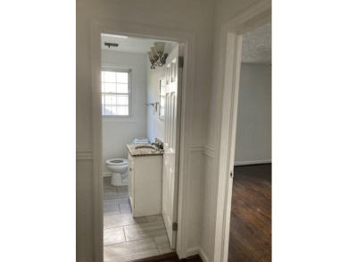 East Atlanta Deal:  This four side brick single family house was on East Lake Golf Club in Georgia - for sale on GolfHomes.com, golf home, golf lot
