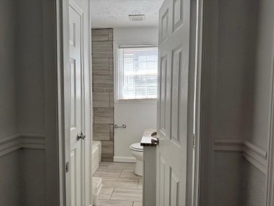 East Atlanta Deal:  This four side brick single family house was on East Lake Golf Club in Georgia - for sale on GolfHomes.com, golf home, golf lot