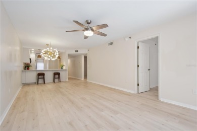 Renovated first floor condo with 2 bedrooms and 2 full baths on Capri Isle Golf Club in Florida - for sale on GolfHomes.com, golf home, golf lot
