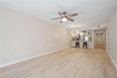 Renovated first floor condo with 2 bedrooms and 2 full baths on Capri Isle Golf Club in Florida - for sale on GolfHomes.com, golf home, golf lot