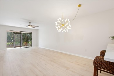 Renovated first floor condo with 2 bedrooms and 2 full baths on Capri Isle Golf Club in Florida - for sale on GolfHomes.com, golf home, golf lot