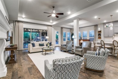 Step into refined luxury with this exquisite one-story residence on The Tribute At the Colony in Texas - for sale on GolfHomes.com, golf home, golf lot