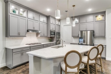Step into refined luxury with this exquisite one-story residence on The Tribute At the Colony in Texas - for sale on GolfHomes.com, golf home, golf lot