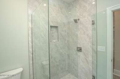 Welcome to your Castle at the Beach! This 4-bedroom 4-bath on Ocean Ridge Plantation in North Carolina - for sale on GolfHomes.com, golf home, golf lot