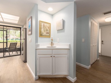 Welcome to this beautifully renovated first-floor 2-bedroom on East Lake Woodlands Country Club in Florida - for sale on GolfHomes.com, golf home, golf lot