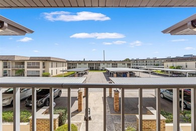 You will love coming home to this beautiful two-bedroom on Gulf Harbors Golf Course in Florida - for sale on GolfHomes.com, golf home, golf lot