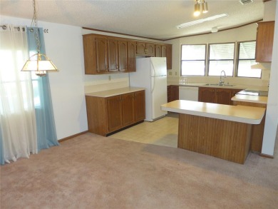 Welcome to the highly sought-after Fox Run community, nestled on on Bay Tree Golf Course in Florida - for sale on GolfHomes.com, golf home, golf lot