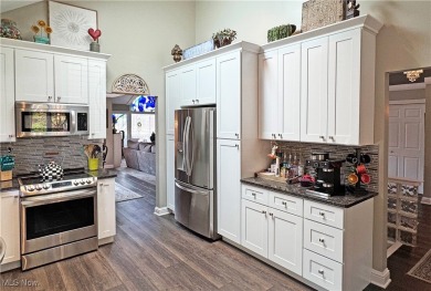 This modern ranch cluster home set on the 10th fairway has on  in Ohio - for sale on GolfHomes.com, golf home, golf lot