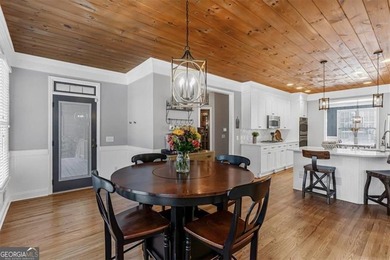 This stunning luxury home at 4027 Hickory Fairway Drive on The Golf Club At Bradshaw Farm in Georgia - for sale on GolfHomes.com, golf home, golf lot