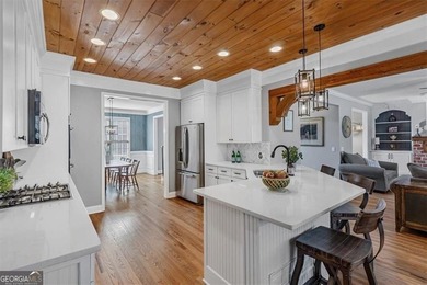 This stunning luxury home at 4027 Hickory Fairway Drive on The Golf Club At Bradshaw Farm in Georgia - for sale on GolfHomes.com, golf home, golf lot