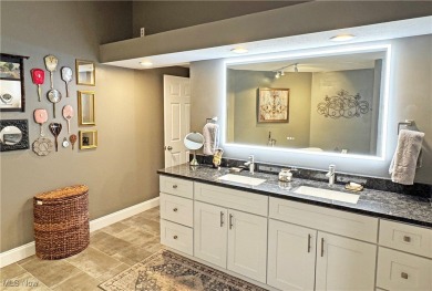 This modern ranch cluster home set on the 10th fairway has on  in Ohio - for sale on GolfHomes.com, golf home, golf lot