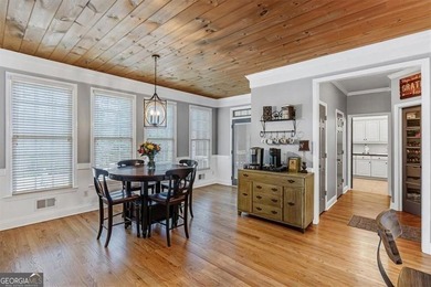 This stunning luxury home at 4027 Hickory Fairway Drive on The Golf Club At Bradshaw Farm in Georgia - for sale on GolfHomes.com, golf home, golf lot