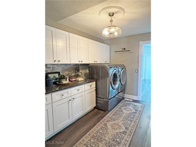 This modern ranch cluster home set on the 10th fairway has on  in Ohio - for sale on GolfHomes.com, golf home, golf lot