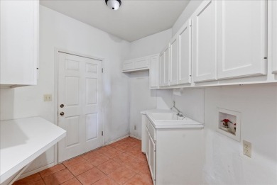Nestled on a quiet, private cul-de-sac in the Rockport Country on Rockport Country Club in Texas - for sale on GolfHomes.com, golf home, golf lot