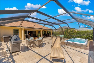 *COMPLETE PRIVACY* FANTASTIC TRAVERTINE LANAI *WATER VIEWS * on Bella Glade Country Club in Florida - for sale on GolfHomes.com, golf home, golf lot
