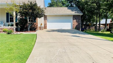 Welcome to your dream home on Holiday Island! This beautifully on Holiday Island Golf Course in Arkansas - for sale on GolfHomes.com, golf home, golf lot