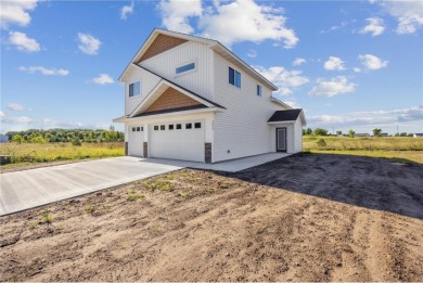 Gorgeous newly built home in the highly sought after Waters Edge on Territory Golf Club in Minnesota - for sale on GolfHomes.com, golf home, golf lot