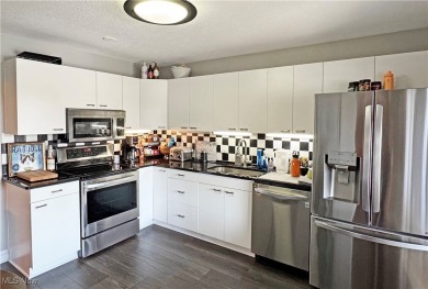This modern ranch cluster home set on the 10th fairway has on  in Ohio - for sale on GolfHomes.com, golf home, golf lot