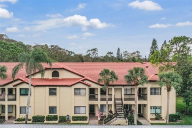 This delightful 2nd Floor Condo located in desirable El Pasado on Tarpon Woods Golf Club in Florida - for sale on GolfHomes.com, golf home, golf lot