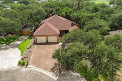 Nestled on a quiet, private cul-de-sac in the Rockport Country on Rockport Country Club in Texas - for sale on GolfHomes.com, golf home, golf lot