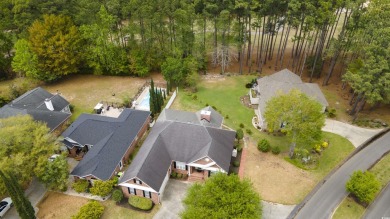 Nestled within the scenic landscape of the River Hills Golf and on River Hills Golf and Country Club in South Carolina - for sale on GolfHomes.com, golf home, golf lot