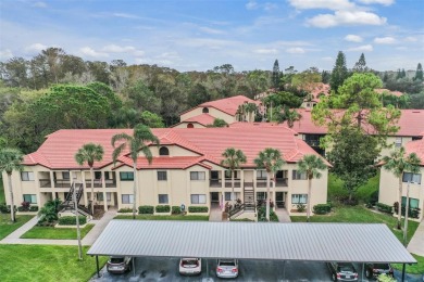 This delightful 2nd Floor Condo located in desirable El Pasado on Tarpon Woods Golf Club in Florida - for sale on GolfHomes.com, golf home, golf lot