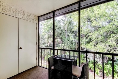 Picture perfect, move-in ready condo, with beautiful private on East Lake Woodlands Country Club in Florida - for sale on GolfHomes.com, golf home, golf lot