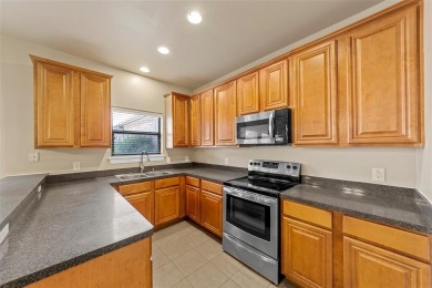 Move in ready condo freshly painted with new carpets! Walking on WestRidge Golf Course in Texas - for sale on GolfHomes.com, golf home, golf lot