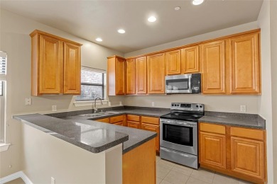 Move in ready condo freshly painted with new carpets! Walking on WestRidge Golf Course in Texas - for sale on GolfHomes.com, golf home, golf lot