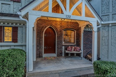 Timeless Tudor elegance meets effortless lake living in this on The Club At Porto Cima in Missouri - for sale on GolfHomes.com, golf home, golf lot