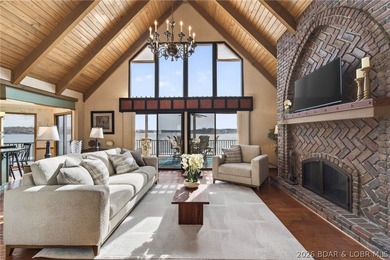 Timeless Tudor elegance meets effortless lake living in this on The Club At Porto Cima in Missouri - for sale on GolfHomes.com, golf home, golf lot