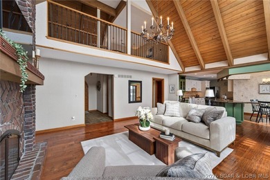 Timeless Tudor elegance meets effortless lake living in this on The Club At Porto Cima in Missouri - for sale on GolfHomes.com, golf home, golf lot