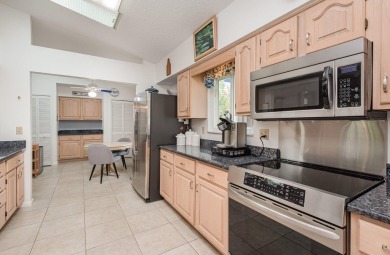 This lovely and versatile Raleigh model, is located in a on Indian River Colony Club in Florida - for sale on GolfHomes.com, golf home, golf lot