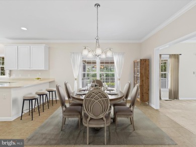 This spacious five-bedroom home invites you into the vibrant on Baywood Greens Golf Club in Delaware - for sale on GolfHomes.com, golf home, golf lot