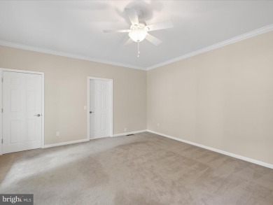 This spacious five-bedroom home invites you into the vibrant on Baywood Greens Golf Club in Delaware - for sale on GolfHomes.com, golf home, golf lot