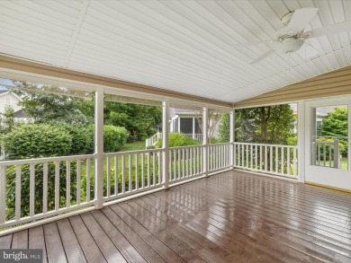 This spacious five-bedroom home invites you into the vibrant on Baywood Greens Golf Club in Delaware - for sale on GolfHomes.com, golf home, golf lot