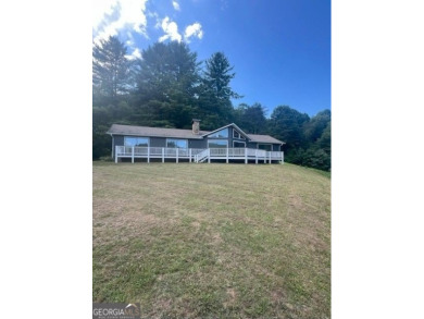 This beautiful completely remolded Home in Sky Valley offers one on Sky Valley Resort and Country Club in Georgia - for sale on GolfHomes.com, golf home, golf lot