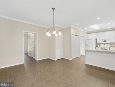 This spacious five-bedroom home invites you into the vibrant on Baywood Greens Golf Club in Delaware - for sale on GolfHomes.com, golf home, golf lot