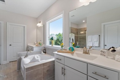 Step into this beautifully crafted, 5BR/4BA gem, ideal for on The Preserve At Jordan Lake Golf Club in North Carolina - for sale on GolfHomes.com, golf home, golf lot